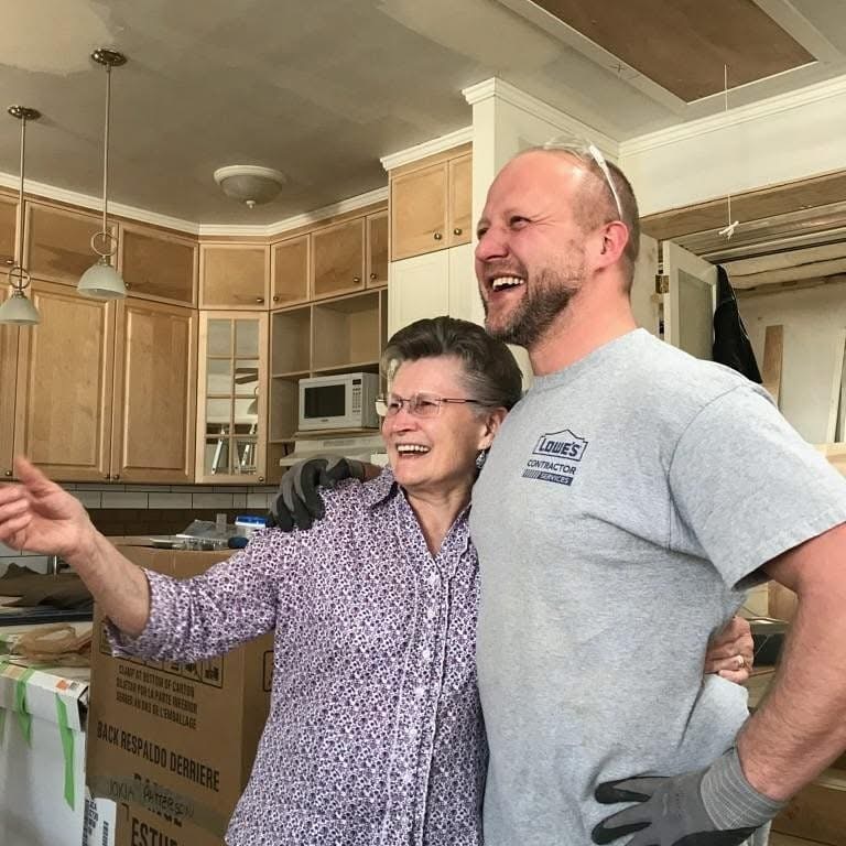 Evgeni Berg discussing a project with a client